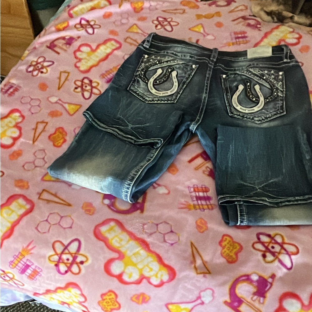 Brand new Miss Me jeans.  Only worn a handful of times.  My loss is your gain.
